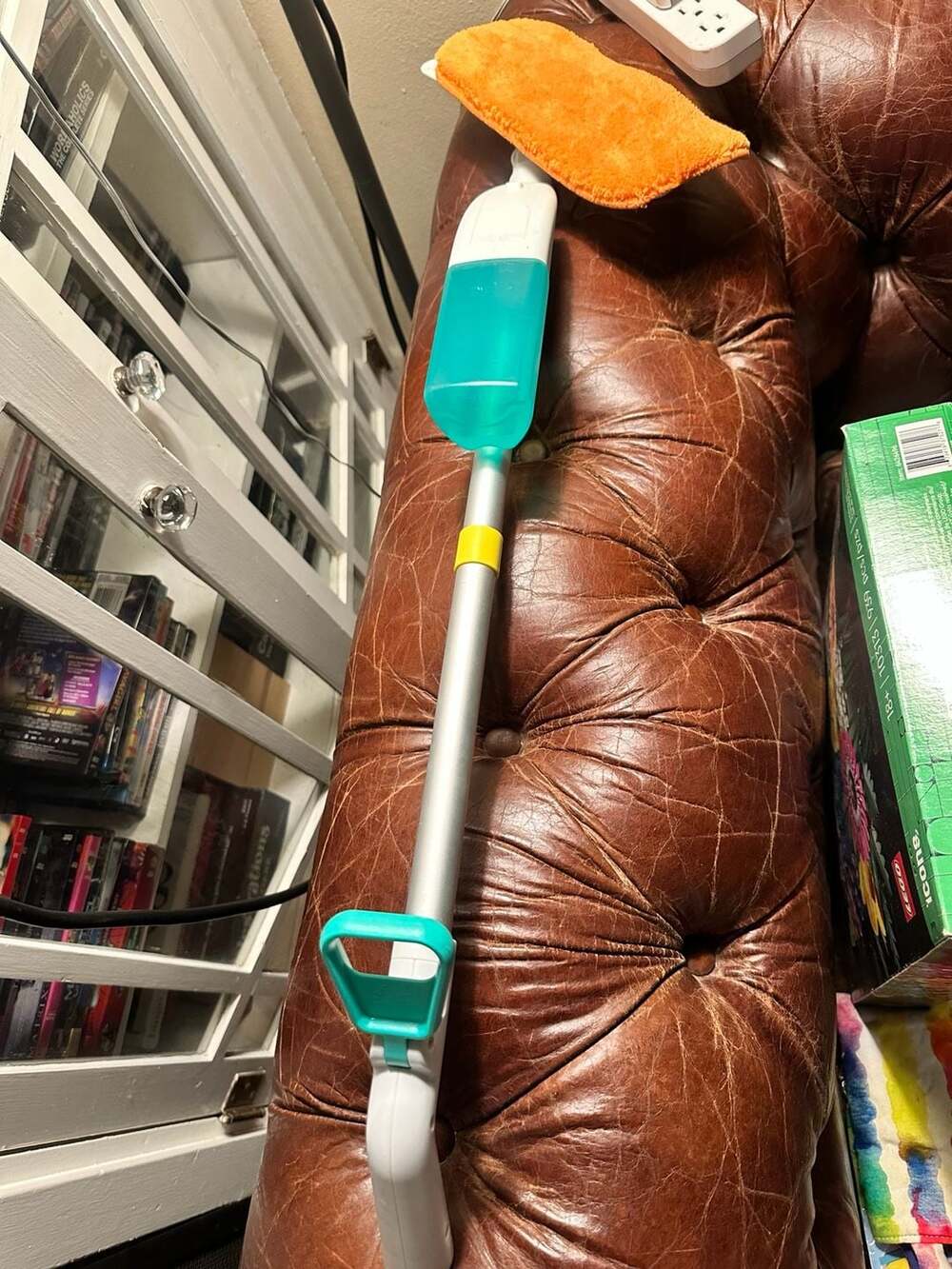 Lovevery Squeeze and Spray Mop from The Storyteller Play Kit